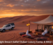 Overnight desert safari Dubai luxury Bedouin camp at sunset in red dunes