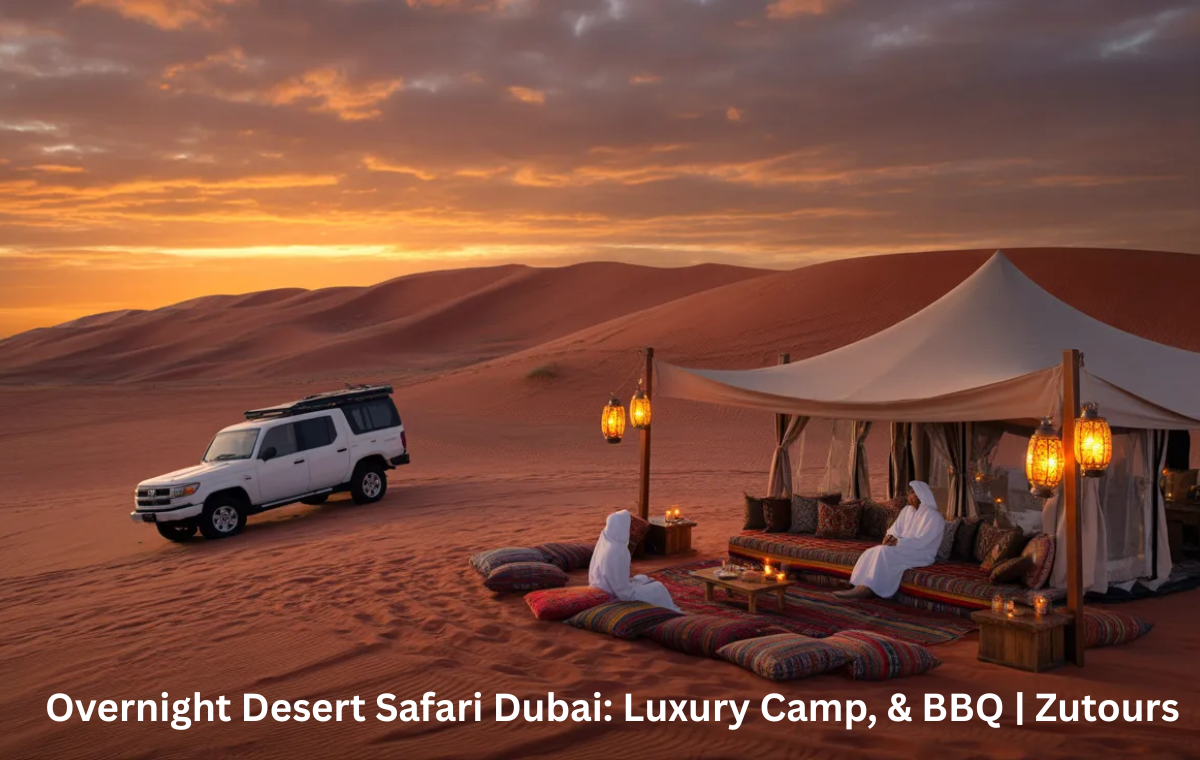 Overnight desert safari Dubai luxury Bedouin camp at sunset in red dunes