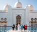 tourists visiting Sheikh Zayed Mosque Abu Dhabi from Dubai tour