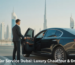 Private car service Dubai with luxury chauffeur and premium sedan near Burj Khalifa