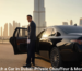 Driver with a car in Dubai private chauffeur service near Burj Khalifa