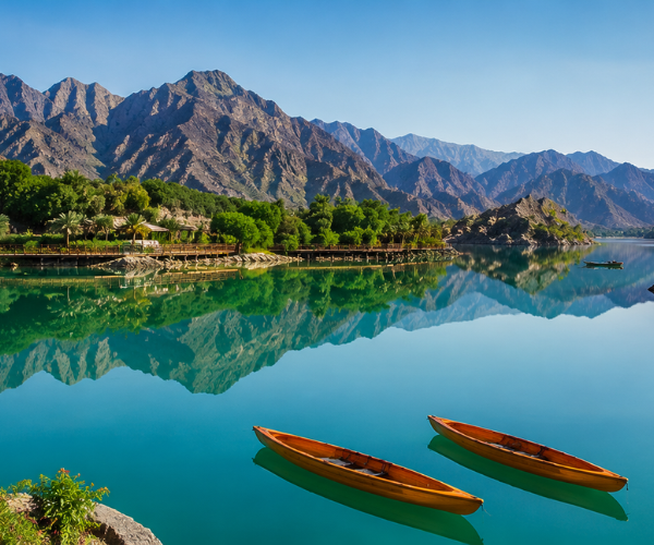 Al Rafisah Dam - Best Tourist Attraction in Khor Fakkan Stunning Al Rafisah Dam with turquoise lake surrounded by Hajar Mountains, one of the best places to visit in Khor Fakkan