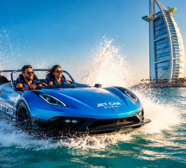 Dubai Jet Car Action Shot with Burj Al Arab View Sleek Jet Car speeding across turquoise water with Burj Al Arab hotel in the background