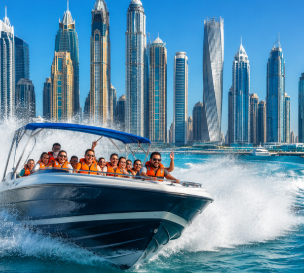 Speedboat Tour Dubai – High-Speed Marina Adventure Speedboat racing through Dubai Marina waters with modern skyscraper skyline in background