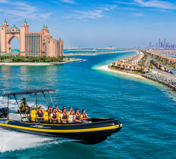 Speedboat Tour Palm Jumeirah and Atlantis Views Speedboat cruising past Palm Jumeirah and Atlantis resort from the water